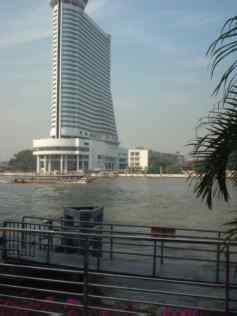 Choa Phraya river overlooked by a new building.